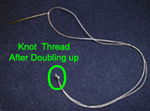 knotting thread when sewing on a button