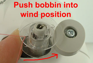 filling a bobbin with thread