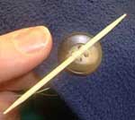 sewing buttons step 7 sewing buttons step 7