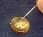 sewing buttons step 4 sewing buttons step 4